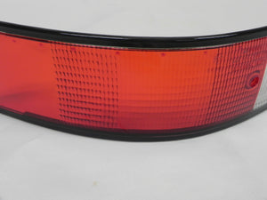 (Used) 911 BOSCH Left Side USA Tail Light Lens with Black Trim - 1973-89