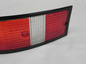 (Used) 911 BOSCH Left Side USA Tail Light Lens with Black Trim - 1973-89