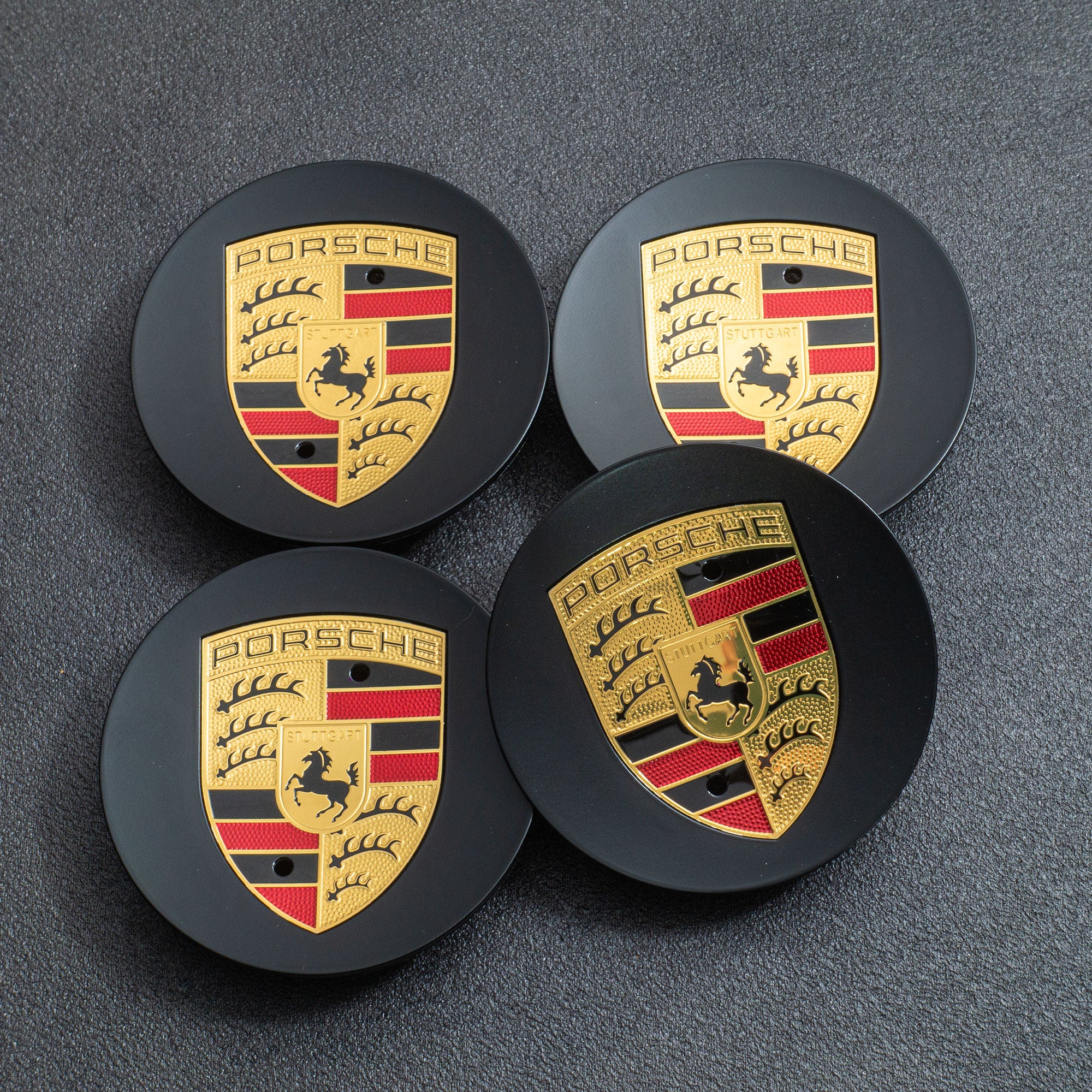 New) 718 Cayman GT4/Spyder Black Colored Crest Hubcap Set