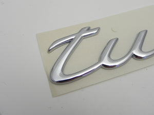 (NOS) 996/997 Chrome "Turbo" Script Emblem - 1999-2012