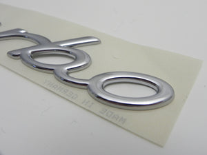 (NOS) 996/997 Chrome "Turbo" Script Emblem - 1999-2012