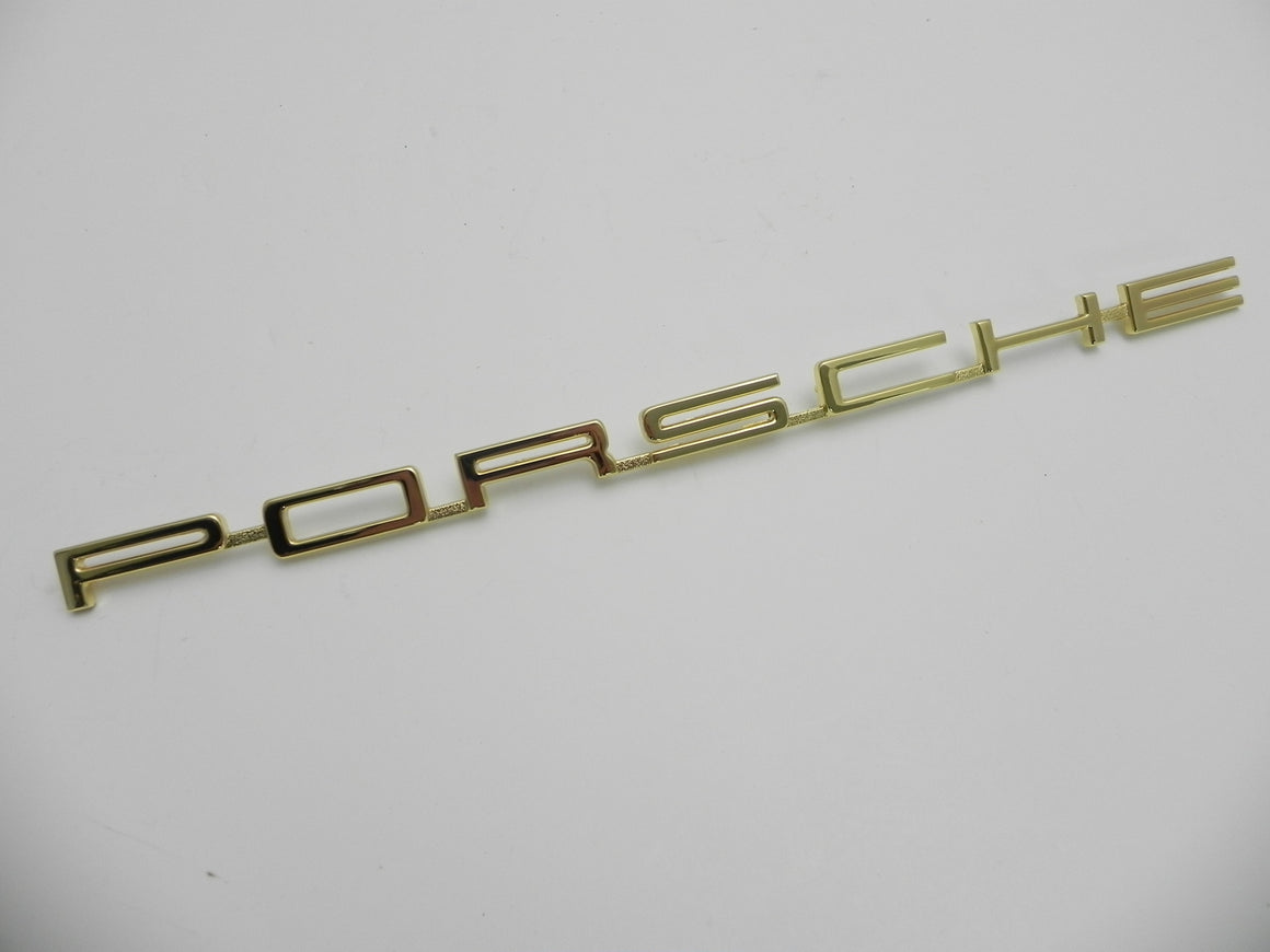 (New) 911/912 Gold One-Piece 'Porsche' Engine Lid Logo - 1965-66