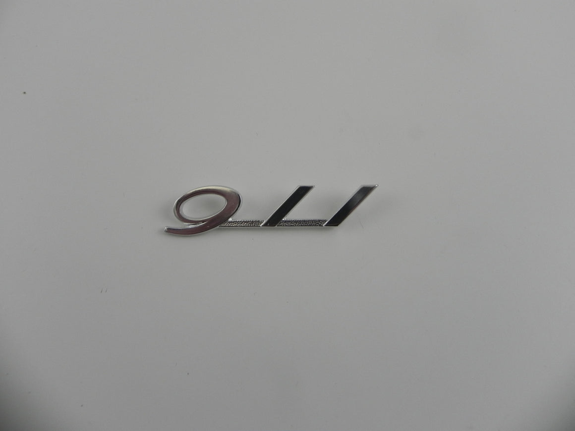 (New) Silver 911 Glove Box Emblem - 1965-66