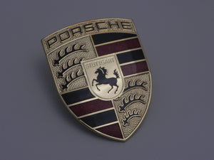 (New) Hood Crest with Maroon Bars and Black Filled Porsche Script - 1995-2018
