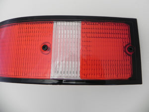 (New) 911 Left Side USA Tail Light Lens with Black Trim - 1973-89